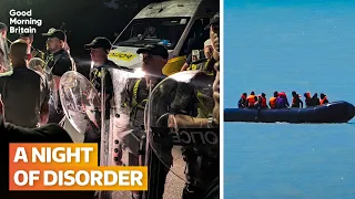 Watch as hundreds of protesters clash with police after migrant boat arrives in Portsmouth