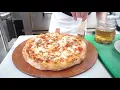 Making pizzas from scratch at Pub 6T5 in New Bedford