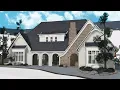 building a REALISTIC WINTER suburban house in bloxburg