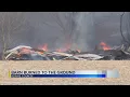 Barn engulfed in flames in Adams County