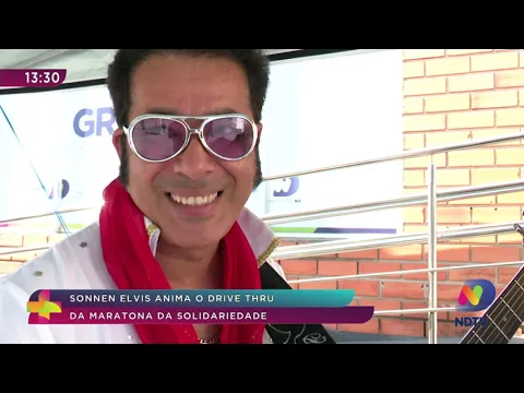 Músico sósia de Elvis anima o drive-thru da Maratona da Solidariedade