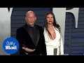 Vin Diesel makes Paloma Jimenez laugh at Vanity Fair Oscar Bash