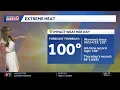 A few showers today record heat Thursday