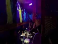 The Guide performing close up magic at The haunted Castle Cafe Premiering an original effect