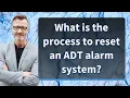 What is the process to reset an ADT alarm system