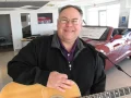 Charlie Leissler a Cherokee celebrity promotes the Jazz Fest on showroom floor VI 0385