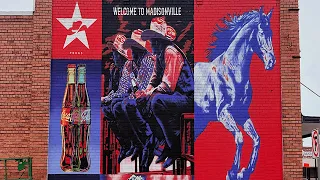 Explore Gabriel Portillo's Coca-Cola Mural in Madisonville, TX, for America250