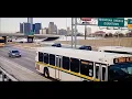 DDOT LOW FLOOR DDOT RTS ON FWY DRIVING BY MICHIGAN AVENUE DOWNTOWN DETROIT