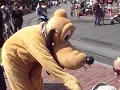 Hannah holding hands with Goofy then Mickey runs away with Goofy