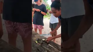 Trying some of the locals foods, this one tasted a little like macadamia nuts… #sailingfamily #food
