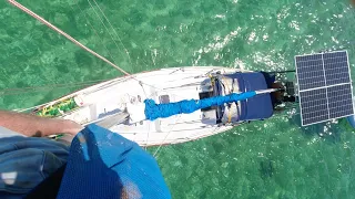 Fixing the Mast on Anchor while surrounded by Tiger Sharks