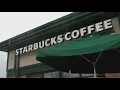 Starbucks workers sue over company s new dress code