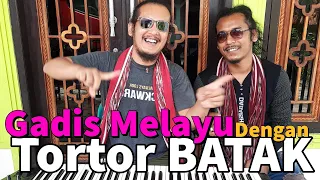 lagu yg sangat terkenal di batak gadis melayu dengan tortor batak siboru toba dengan goyang deli