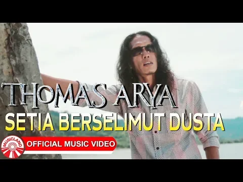Download MP3 Thomas Arya - Setia Berselimut Dusta [Official Music Video HD]