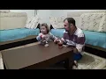 Little girl crying because the father is not eating chocolate