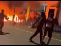 Download Lagu In Indonesia, young people have set fire to police and soldiers  by pouring petrol on them in riots.
