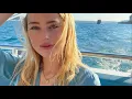 Amber Heard Stuns in Vibrant Bikini Shows Off Toned Figure