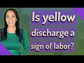 Is yellow discharge a sign of labor