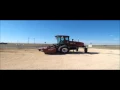 2012 MacDon M205 self-propelled windrower for sale no-reserve Internet auction March 30 2016