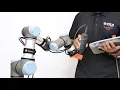 SensONE 6-axis force torque sensor hand guiding a UR Bota Systems