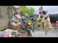 Girl repairs and restores flooded scrap motorbikes abandoned long ago.