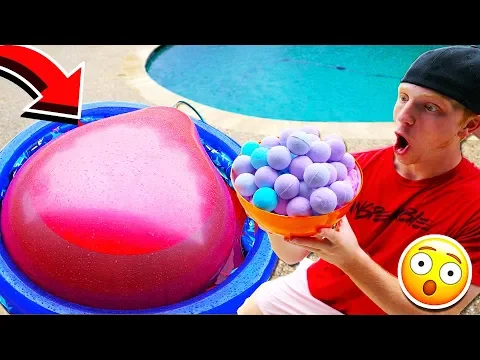 Download MP3 PUTTING 100 BATH BOMBS IN A 6FT WATER BALLOON!