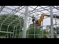40x80 with 15x20 lean to Eagle carport garage wall sheets going up