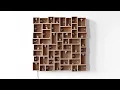 Zimoun : Sound Sculpture : 52 prepared dc-motors, cork balls, mdf boxes, 2016