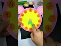 Use cardboard to make a small alarm clock that can move around and easily teach children craft
