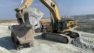 Caterpillar 390D Excavator Loading Mercedes And MAN 4 Axle Trucks - Pyramis Ate