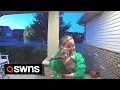 Doorbell cam captures emotional moment cat owner is reunited with lost pet SWNS