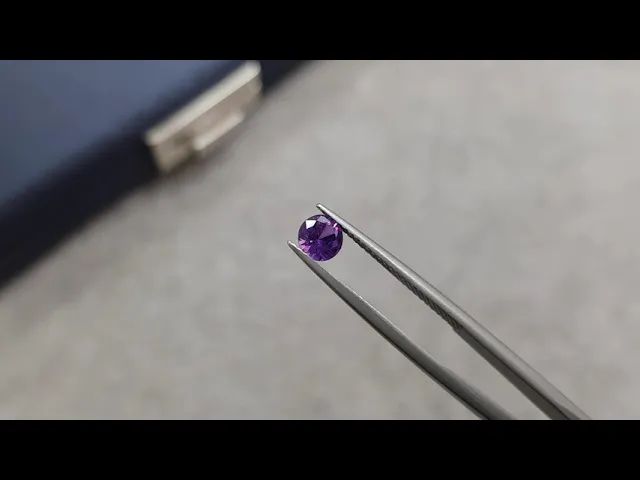 Untreated round violet sapphire 0.60 ct from Madagascar Video  № 2