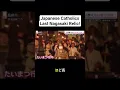 Japanse katholieken dragen Onze-Lieve-Vrouw van Nagasaki, een houten beeld dat de atoombom heeft ...