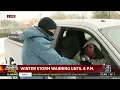 People sitting in cars amid power outages in Fort Bend County