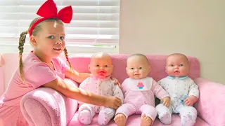 Naomi pretend play with Baby Dolls and girl toys
