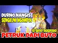 Petruk nesu dadi buto gedi banget ngebak i kelir arep nguntal sengkuni lan durno