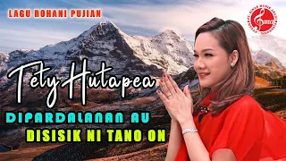 Download Tety Hutapea - Dinamardalan Au Disisik Ni Tano On (Official Music Video) Lagu Batak Rohani Terbaru MP3