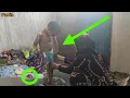 bathing Ali s little son in a container by his mother due to the lack of a bathroom