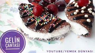 İki kek arasına sürülen kremasıyla hindistancevizi ile kaplanan imam sarığı tarifi sizler için payla. 