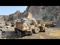 Download Lagu Mighty Machine: Caterpillar 966D Loading Massive Stones into Huge Dump Trucks