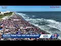 Hundreds of Santas take over Cocoa Beach in annual surfing event