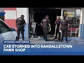 Car stormed into Randallstown pawn shop witnesses say
