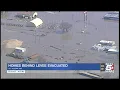 Families in St Joseph pack up to get out of the way of floodwaters
