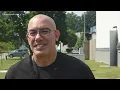 People lined up to buy whole flower cannabis at Portsmouth medical marijuana dispensary