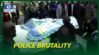 eight south african police officers on trial over killing of nigerian
