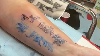 Learning to Tattoo Tattooing a negative space cross and flowers on my niece s forearm