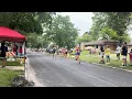 Watch as participants run on Kirkwood Boulevard at the Quad-City Times Bix 7
