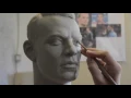 Sculpting a head in clay