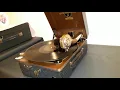 Small Columbia No. 100 portable gramophone playing Les Paul and Mary Ford song