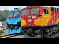 WAG-12 And WAG-9 Featuring A Massive Freight Formation With Locomotive Power In The Middle